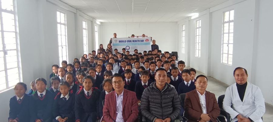 Students and others during the World Oral Health Day observed at Government High School, Zhadima village on March 20.